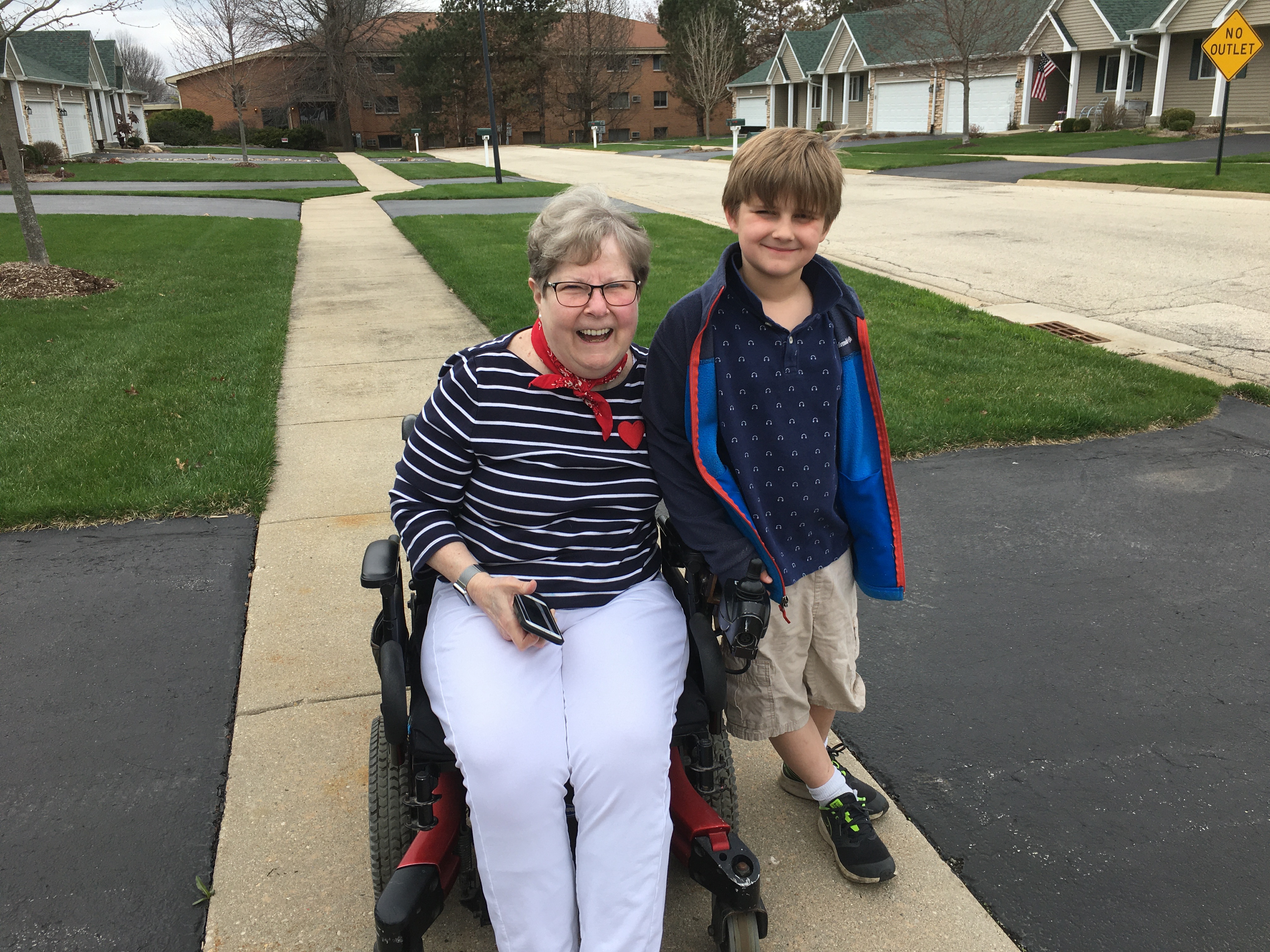 Photo of Regina Potts and a little boy