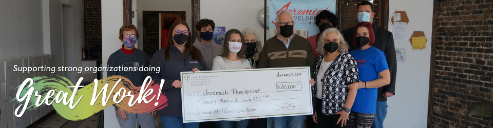 Supporting Strong Organizations doing Great Work. Jeremiah Development board members receive check from CFNIL