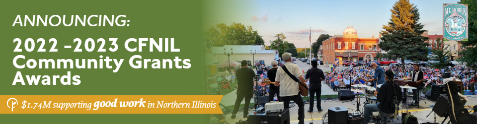 Picture taken from on stage behind a band playing instruments, looking out over a crowd in a town square. In the background, brick buildings and a water tower which reads Mt Morris. Text reads: $1.74M supporting good work in Northern Illinois. Announcing: 2022 - 2023 CFNIL Community Grants Awards