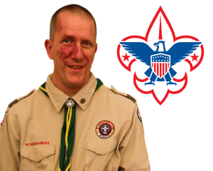 Photo of Mr. Mark and a Scouting logo 
